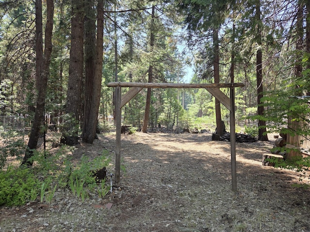 8421 Starlite Pines Rd, Shingletown, CA 96088 - view of yard featuring a view of trees