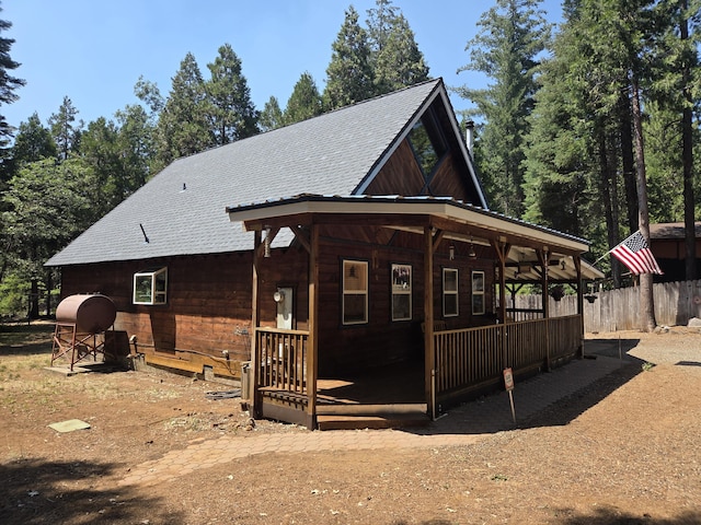 8421 Starlite Pines Rd, Shingletown, CA 96088 - back of property featuring a shingled roof