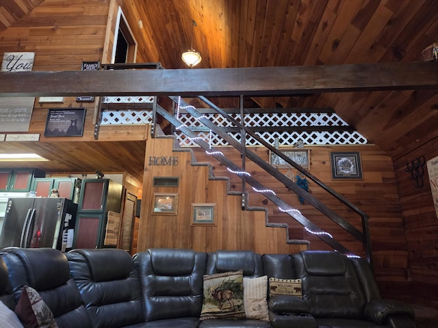 8421 Starlite Pines Rd, Shingletown, CA 96088 - living area featuring wooden walls, wooden ceiling, and stairs