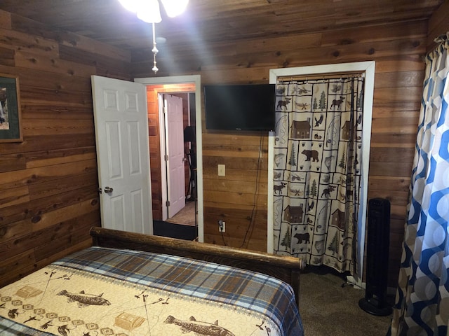 8421 Starlite Pines Rd, Shingletown, CA 96088 - bedroom with wooden walls and carpet flooring