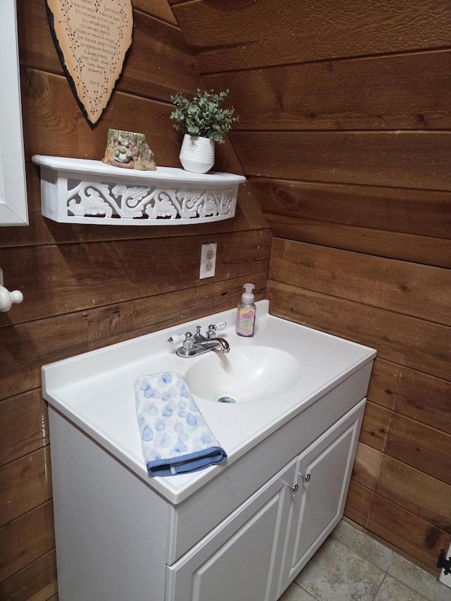 8421 Starlite Pines Rd, Shingletown, CA 96088 - bathroom featuring wooden walls and vanity