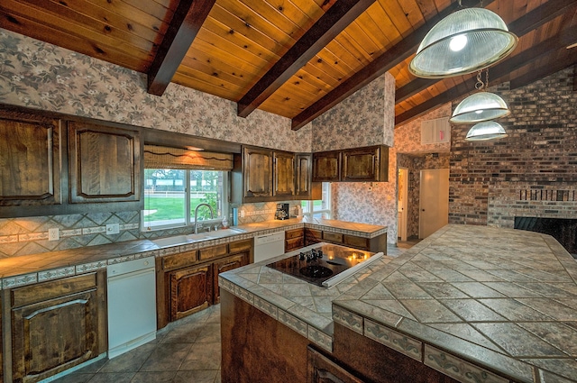 21790 Adobe Rd, Red Bluff, CA 96080 - kitchen with black electric cooktop, dishwasher, wooden ceiling, dark brown cabinets, and tile counters
