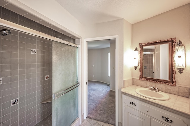 21790 Adobe Rd, Red Bluff, CA 96080 - bathroom featuring a shower stall, vanity, and tile patterned flooring