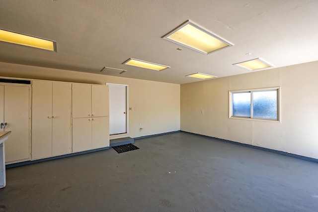 21790 Adobe Rd, Red Bluff, CA 96080 - garage featuring baseboards