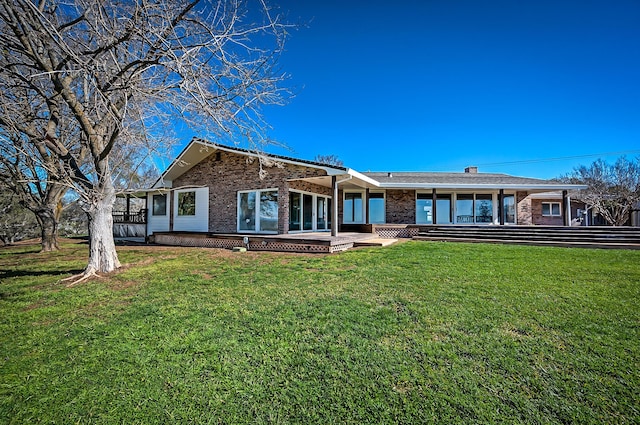 21790 Adobe Rd, Red Bluff, CA 96080 - rear view of property featuring a yard and brick siding