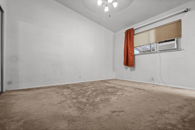 4100 Fort Peck St, Shasta Lake, CA 96019 - spare room featuring vaulted ceiling, carpet floors, a ceiling fan, and cooling unit