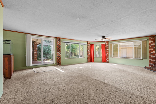 4100 Fort Peck St, Shasta Lake, CA 96019 - unfurnished living room with a textured ceiling, a ceiling fan, and carpet floors