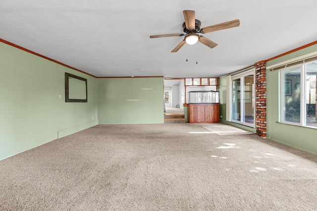 4100 Fort Peck St, Shasta Lake, CA 96019 - unfurnished living room featuring carpet, ceiling fan, and ornamental molding