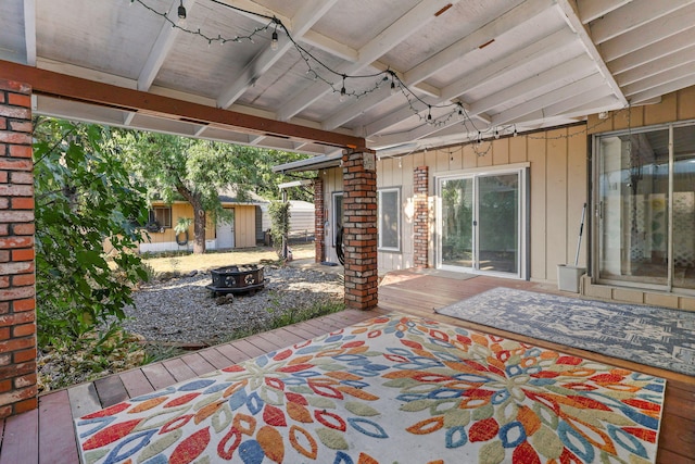 4100 Fort Peck St, Shasta Lake, CA 96019 - view of patio / terrace with an outdoor fire pit, a wooden deck, and a storage shed