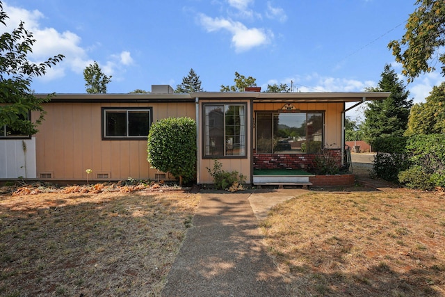 4100 Fort Peck St, Shasta Lake, CA 96019 - view of front of house with crawl space and a chimney