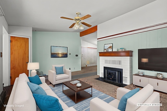 4100 Fort Peck St, Shasta Lake, CA 96019 - carpeted living area with a ceiling fan, lofted ceiling, and a fireplace with flush hearth