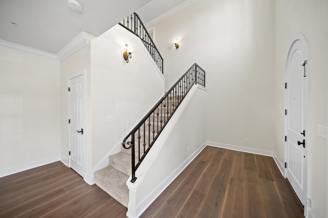 5569 Diamond Ridge Dr, Redding, CA 96003 - foyer with wood finished floors, ornamental molding, and stairway