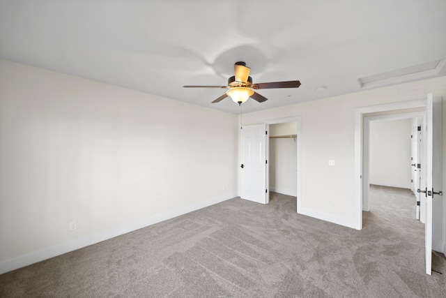 5569 Diamond Ridge Dr, Redding, CA 96003 - unfurnished bedroom featuring attic access, carpet floors, and a ceiling fan