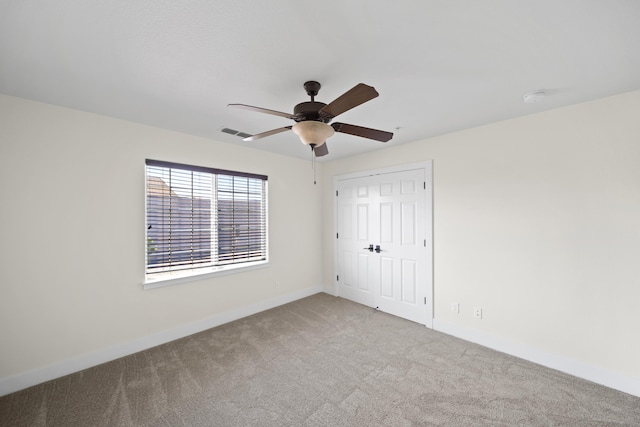 5569 Diamond Ridge Dr, Redding, CA 96003 - unfurnished bedroom with carpet floors, a closet, and ceiling fan
