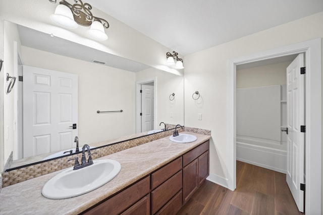 5569 Diamond Ridge Dr, Redding, CA 96003 - bathroom with wood finished floors and double vanity