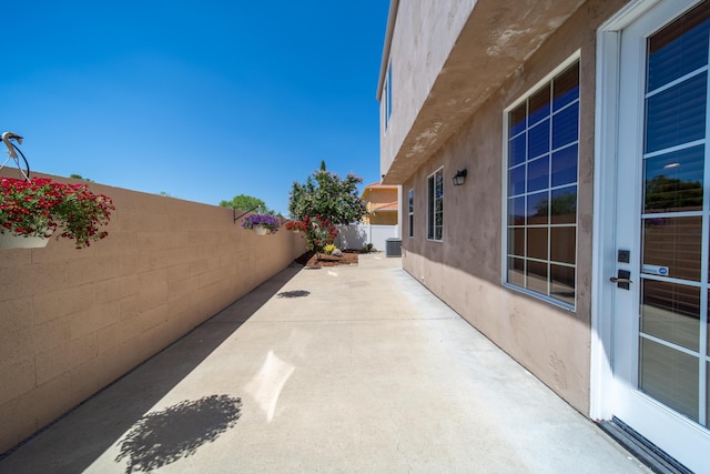 5569 Diamond Ridge Dr, Redding, CA 96003 - fenced backyard featuring a patio area