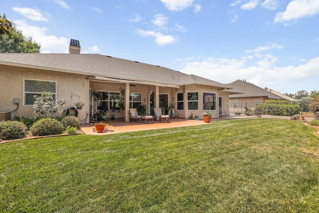 1533 Spanish Bay Dr, Redding, CA 96003 - back of property featuring a patio area, stucco siding, a chimney, and a shingled roof