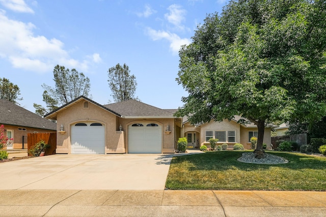 1533 Spanish Bay Dr, Redding, CA 96003 - ranch-style house featuring an attached garage, concrete driveway, and stucco siding