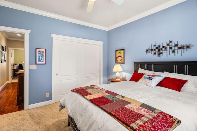 1533 Spanish Bay Dr, Redding, CA 96003 - bedroom featuring ornamental molding, a closet, carpet, and a ceiling fan