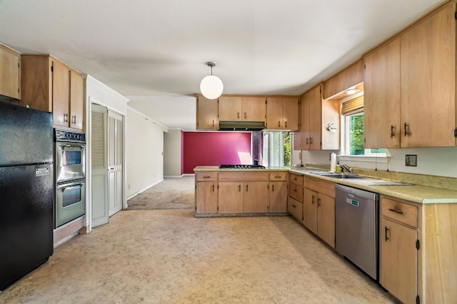 1198 Denton Way, Redding, CA 96002 - kitchen with stainless steel appliances, light countertops, under cabinet range hood, a peninsula, and pendant lighting
