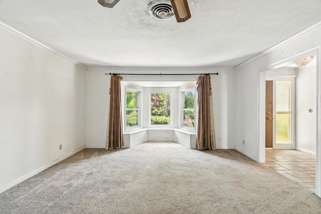 1198 Denton Way, Redding, CA 96002 - spare room with crown molding, carpet, a ceiling fan, and a textured ceiling