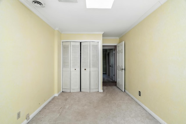 1198 Denton Way, Redding, CA 96002 - unfurnished bedroom featuring light carpet, a closet, and crown molding