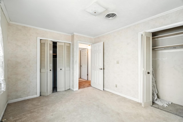 1198 Denton Way, Redding, CA 96002 - unfurnished bedroom with carpet, ornamental molding, and multiple closets