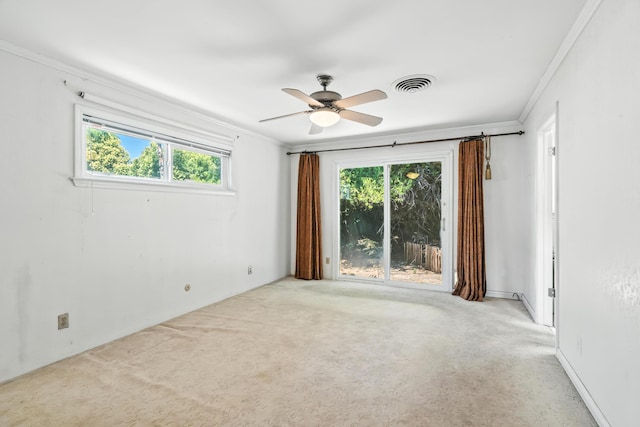 1198 Denton Way, Redding, CA 96002 - empty room with crown molding, healthy amount of natural light, carpet floors, and a ceiling fan