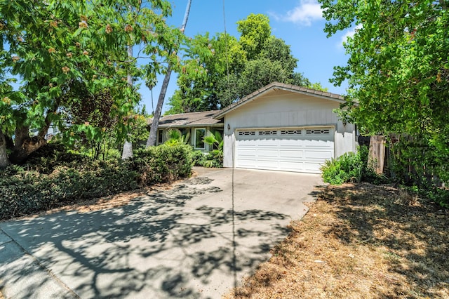 1198 Denton Way, Redding, CA 96002 - ranch-style house with concrete driveway and an attached garage