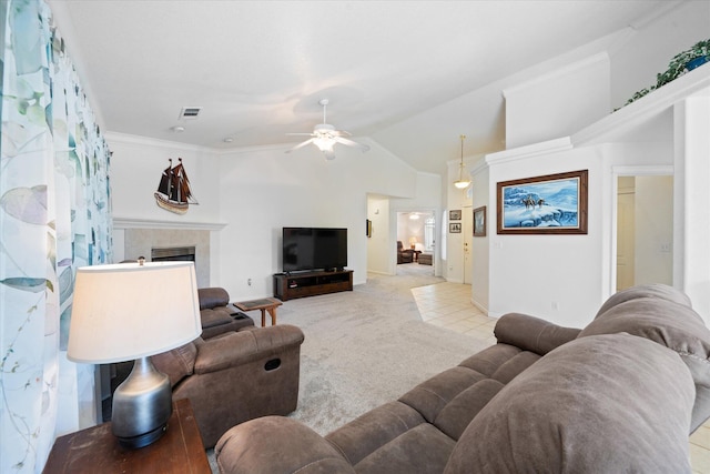 2790 Citrine Ave, Redding, CA 96001 - living room with ceiling fan, a fireplace, light carpet, and vaulted ceiling