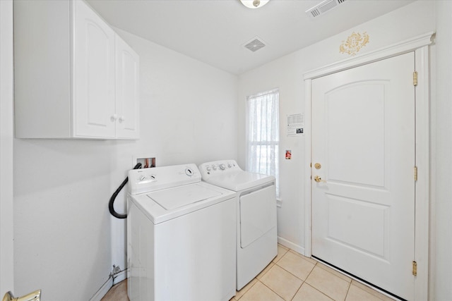 2790 Citrine Ave, Redding, CA 96001 - laundry room featuring cabinet space, independent washer and dryer, and light tile patterned floors