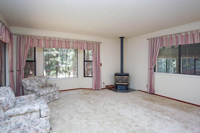 30839 Tinkerbell Ln, Shingletown, CA 96088 - unfurnished room featuring carpet flooring and a wood stove