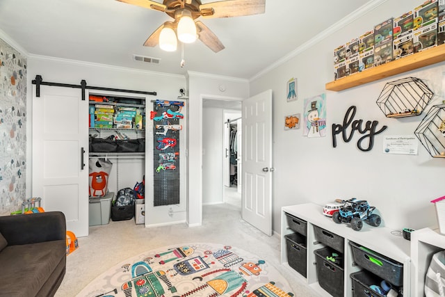 4020 Oro St, Redding, CA 96001 - playroom with ornamental molding, ceiling fan, carpet floors, and a barn door