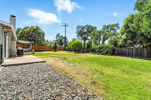 4020 Oro St, Redding, CA 96001 - fenced backyard featuring a patio
