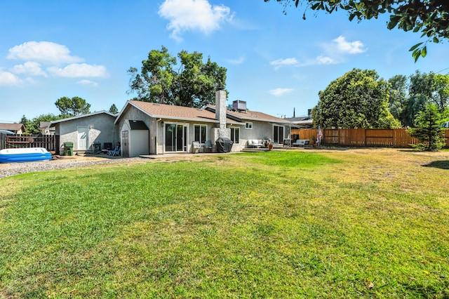 4020 Oro St, Redding, CA 96001 - back of house with a patio area, a fenced backyard, and stucco siding
