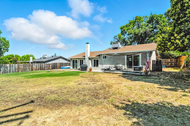 4020 Oro St, Redding, CA 96001 - back of property with a patio area and a fenced backyard
