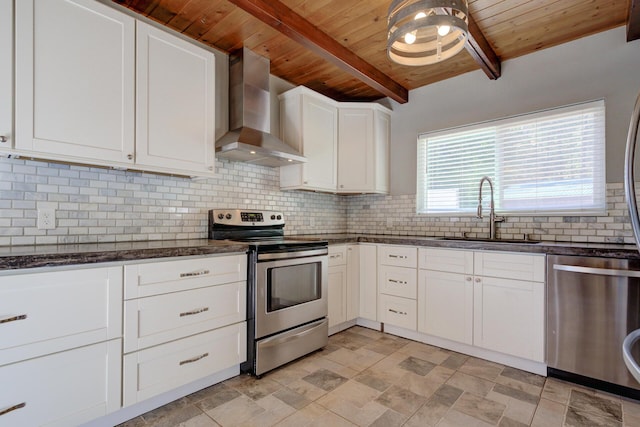 311 Ward Placer Pl, Weaverville, CA 96093 - kitchen featuring wall chimney range hood, stainless steel appliances, a wooden ceiling with exposed beams, backsplash, and dark stone counters