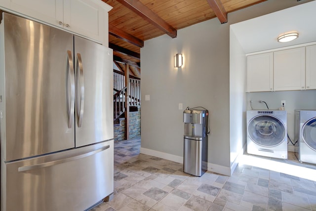 311 Ward Placer Pl, Weaverville, CA 96093 - washroom with washing machine and dryer, wood ceiling, stone finish floors, and cabinet space
