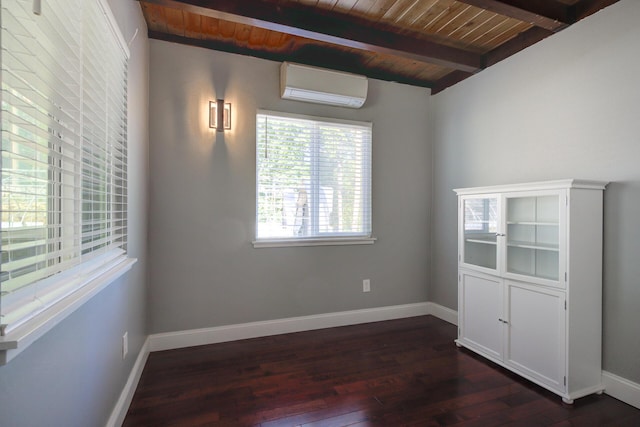 311 Ward Placer Pl, Weaverville, CA 96093 - unfurnished room with a wall mounted air conditioner, a wooden ceiling with exposed beams, and dark wood-style floors