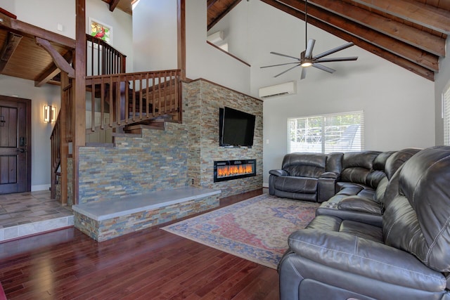 311 Ward Placer Pl, Weaverville, CA 96093 - living area with an AC wall unit, high vaulted ceiling, ceiling fan, wood finished floors, and stairs