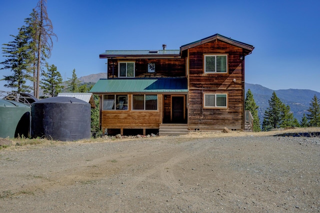 311 Ward Placer Pl, Weaverville, CA 96093 - view of front of house with entry steps, a mountain view, and a metal roof