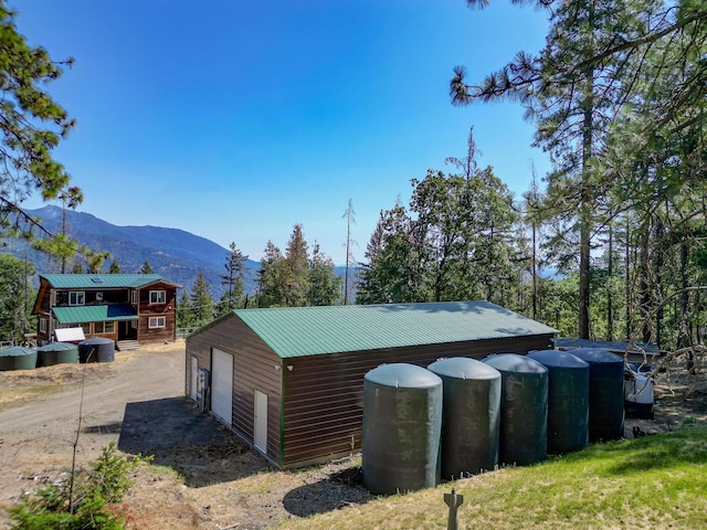 311 Ward Placer Pl, Weaverville, CA 96093 - view of outdoor structure featuring a mountain view and driveway