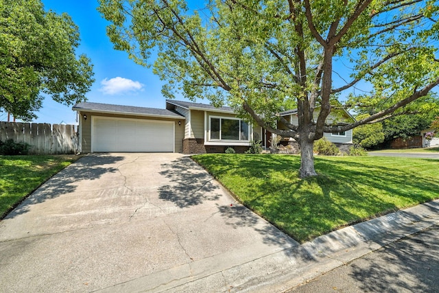 2045 Washington Ave, Red Bluff, CA 96080 - view of front of property featuring driveway, a garage, and brick siding
