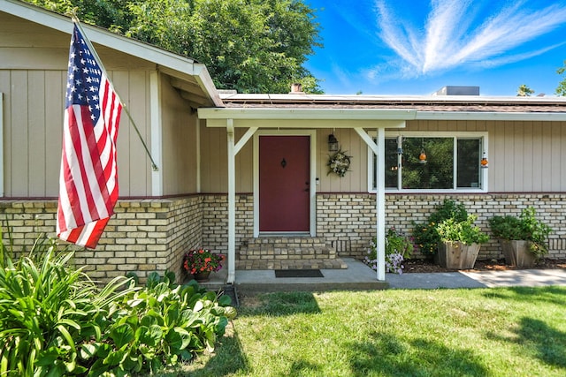 24470 Oklahoma Ave, Red Bluff, CA 96080 - property entrance featuring brick siding and a yard