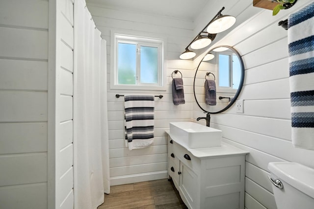 24470 Oklahoma Ave, Red Bluff, CA 96080 - full bath featuring wood finished floors, vanity, and wood walls