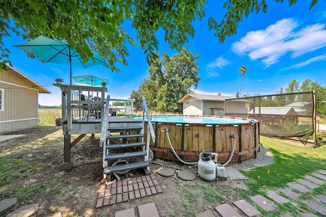 24470 Oklahoma Ave, Red Bluff, CA 96080 - view of yard with an outdoor pool and a playground