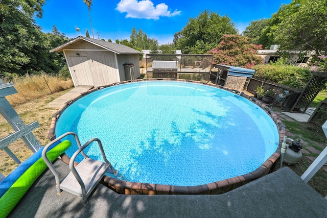 24470 Oklahoma Ave, Red Bluff, CA 96080 - view of pool with a storage shed and a wooden deck