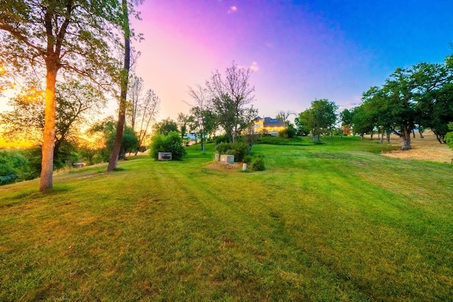 23795 Deer Canyon Rd, Millville, CA 96062 - yard at dusk featuring a lawn