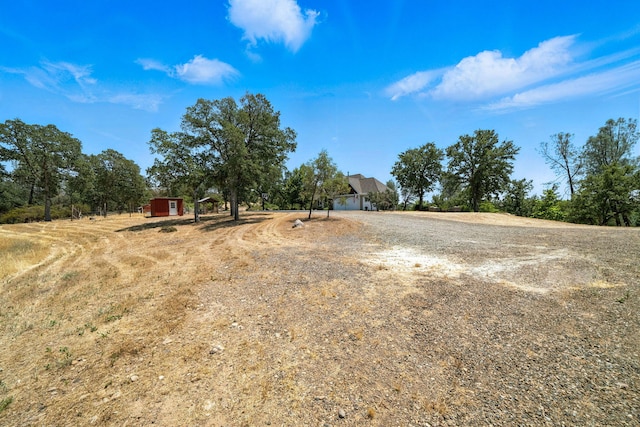 23795 Deer Canyon Rd, Millville, CA 96062 - view of yard with a storage unit