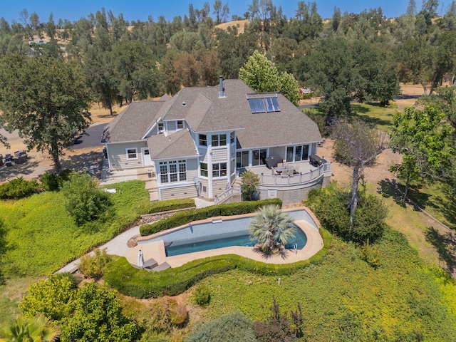 23795 Deer Canyon Rd, Millville, CA 96062 - rear view of property with stairs, a deck, an outdoor pool, a shingled roof, and a patio area